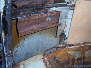 rusted rear quarter cargo area