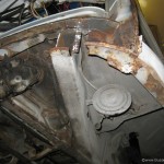 drivers side rusted panel