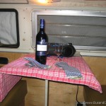 Red wine and table cloth in our Westfalia