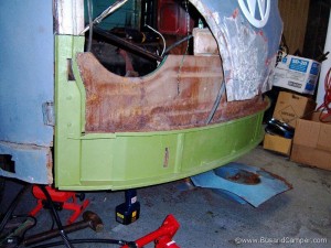 VW green metal repair panels in place on our 65 bus