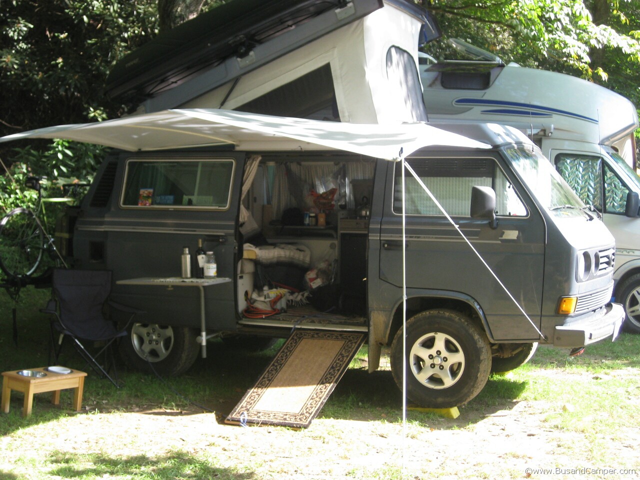 Grey Westy setup and sun shade pop top