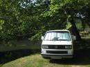 Later White Campervan next to the river