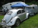 Silver Oval and arrow straight panel van